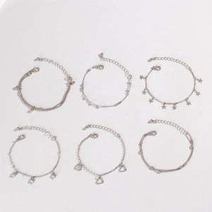 Six-piece set of silver-tone bracelets with heart, star charms and bead fringe details
