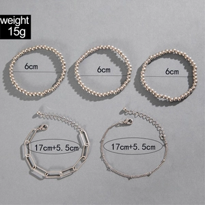 Detail of 5-piece silver beaded and link chain bracelet set with size specifications