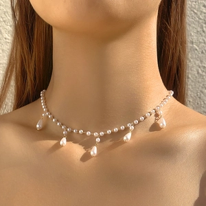 French retro necklace with white seed pearls and elegant teardrop pearl pendants