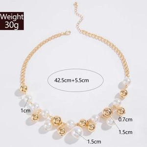 Detail view of irregular pearl and gold bead necklace showing 42.5cm plus 5.5cm length
