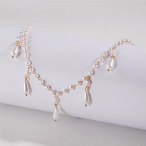 French luxury irregular pearl necklace with gold droplet pendants and elegant beads