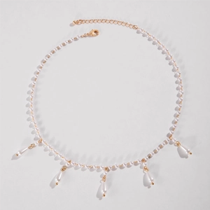 French style gold pearl necklace featuring round beads and teardrop pendants with lobster clasp