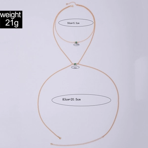 Detail of gold layered body chain with emerald heart and weight specs 21g for men