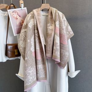 Thick warm autumn scarf with abstract landscape pattern and pink fringe tassels