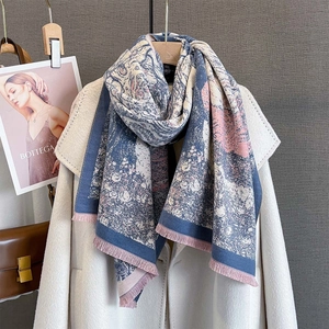Detail of floral jacquard pashmina scarf with elegant pink fringe and oil painting pattern