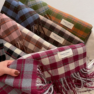 Classic British style checkered scarf with tassels and elegant label in multiple colors