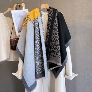 Thick jacquard shawl with leopard and zebra prints in yellow, grey, and black patterns