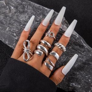 6-piece silver irregular geometric open ring set with bow and spiral knot designs