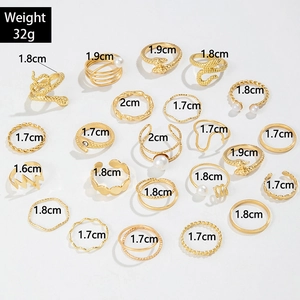 24-piece vintage gold alloy ring set with butterfly, moon, and snake patterns