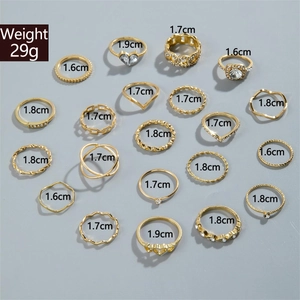 Detailed size guide for a 20-piece gold ring set featuring varied band diameters and weight