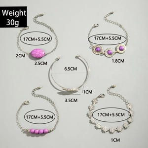 Detail of 5-piece Bohemian silver alloy bracelets with purple turquoise and floral charms