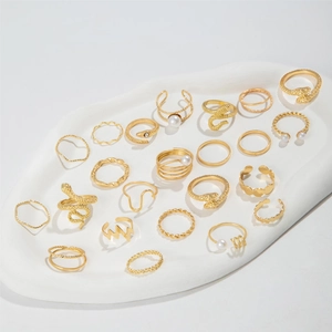 22-piece gold vintage ring set with snake designs, faux pearls, and textured bands