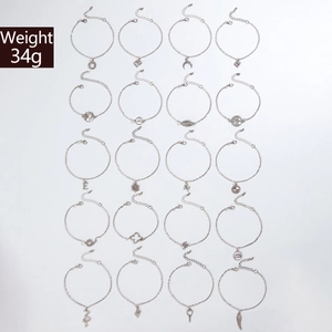 Detailed grid showing 20 piece silver alloy anklet set with varied charms and lobster clasp