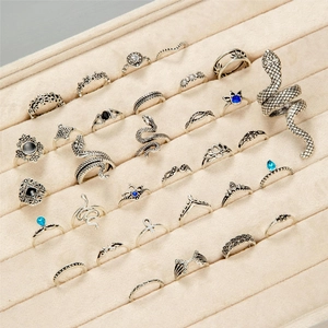 32-piece vintage silver boho ring set with snake, lotus, and gemstone designs