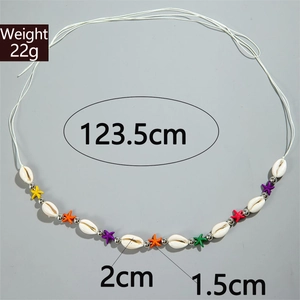 Detail of beach waist chain featuring natural shells and colorful starfish beads