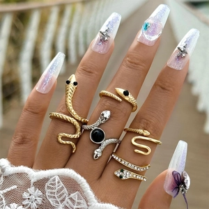 5-piece snake ring set in gold and silver finish with crystal accents for women