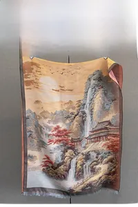 Detail of cashmere-like scarf showing fine jacquard weave and traditional landscape pattern
