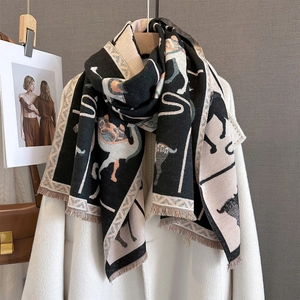 Premium jacquard animal print scarf with fringes styled on a white coat for winter