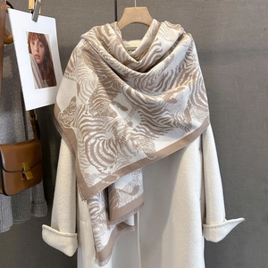 Beige and brown zebra pattern cashmere scarf with soft fringes and animal print texture