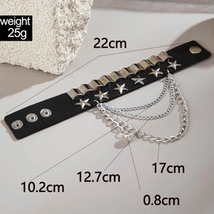 Detailed view of punk leather bracelet with star studs, metal chains and size markings