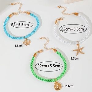 Detailed size view of bohemian woven anklets with starfish, shell and fish charms
