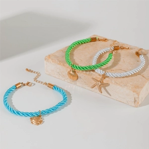 Three-piece bohemian colorful braided anklet set with starfish and seashell charms