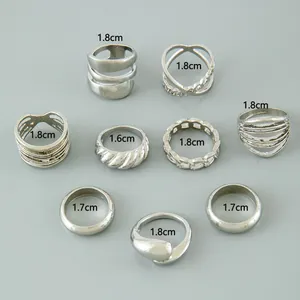 Size guide for a 9-piece punk jewelry ring set showing inner diameter measurements