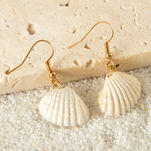 Bohemian shell and starfish drop earrings with golden hooks for beach vacation style