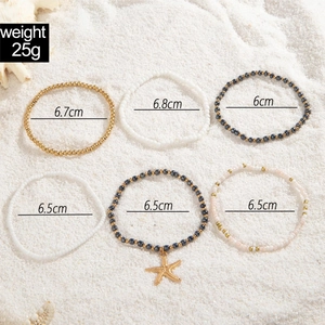 Detail of 6-piece bohemian beach anklet set with colorful beads and starfish pendant