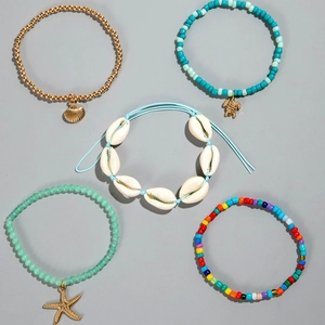 Detailed set of 5 Bohemian anklets featuring starfish, shells, and colorful beads