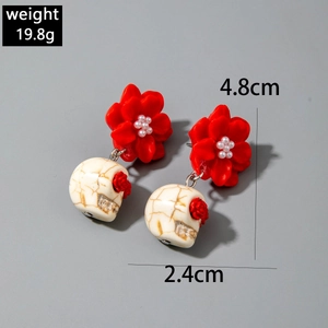 Detail of Gothic skull and red camellia earrings with pearl beads and dimensions