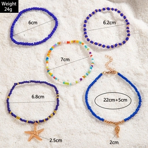 Detail shot of five-piece shell and starfish bead anklet set with weight and size data