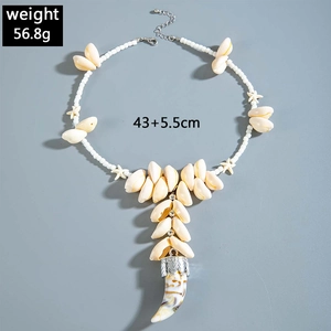 Detailed shot of bohemian shell beaded necklace with starfish charms and 56.8g weight