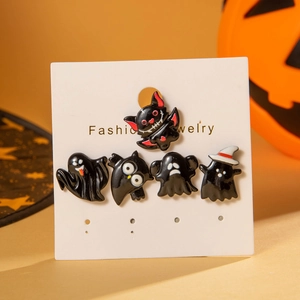 Halloween earring set with black ghost, bat and owl motifs on a festive card