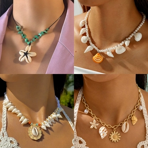 Bohemian shell and starfish pendant necklace set featuring beach style layered jewelry