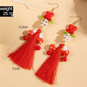 Boucles d'oreilles tête de mort et cœur avec longs glands rouges pour fête d'Halloween