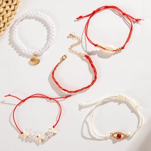 Summer beach bracelet set with evil eye, imitation pearls, and sea shell charms