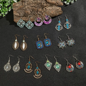 Set of 10 pairs of bohemian vintage ethnic earrings with colorful crystals and carvings