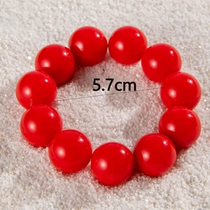 Detailed view of red ethnic beads bracelet with 5.7cm inner diameter measurement