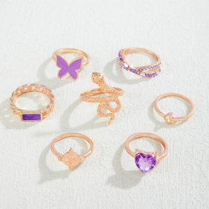 Ensemble de 7 bagues papillon et serpent violettes plaqué or rose avec zircons cœur