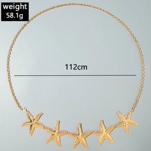 Detail of a 112cm gold starfish waist chain featuring textured charms and 58.1g weight