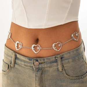 Close-up of silver starfish waist chain with heart-shaped moon and star charms