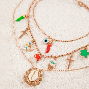 Bohemian multilayer gold necklace with shell pendant, evil eye and colorful charms