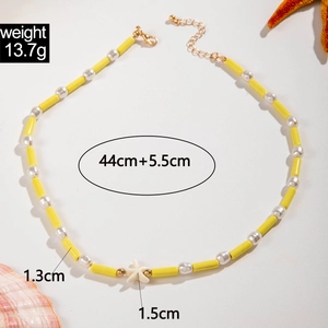 Detail of bohemian shell necklace with yellow beads and starfish pendant dimensions