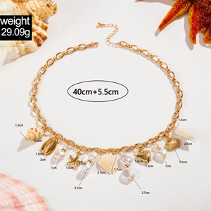 Bohemian ocean theme necklace with starfish shell heart charms and pearls