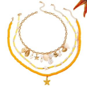 Three-piece bohemian ocean necklace set with starfish, shells and colorful beads
