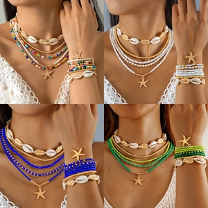 Bohemian shell jewelry set featuring starfish beads and multi-layer colorful necklace