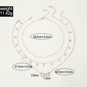 Detailed size specifications for triple-layered silver necklace with stars and pearls