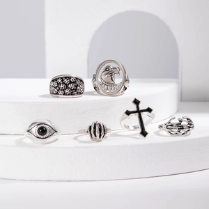 Set of 6 vintage punk rings featuring skull, eagle, cross and evil eye in silver finish