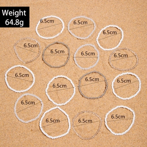 Detail of 15-piece Bohemian beaded bracelet set in white and silver, 6.5cm diameter